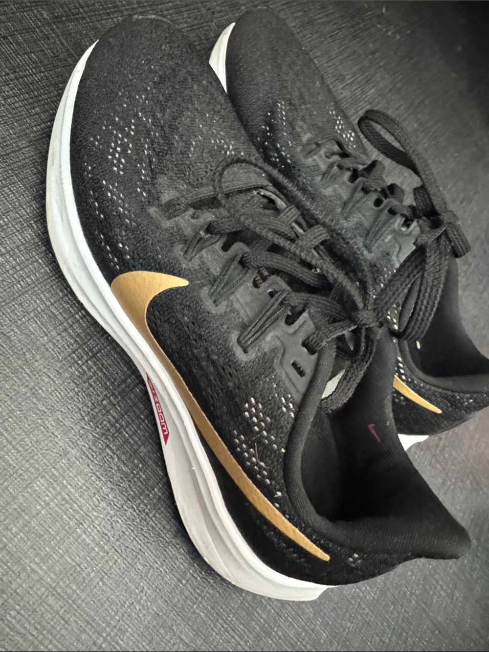 Nike Women’s Black and Gold Zoom Running Shoes Size 6